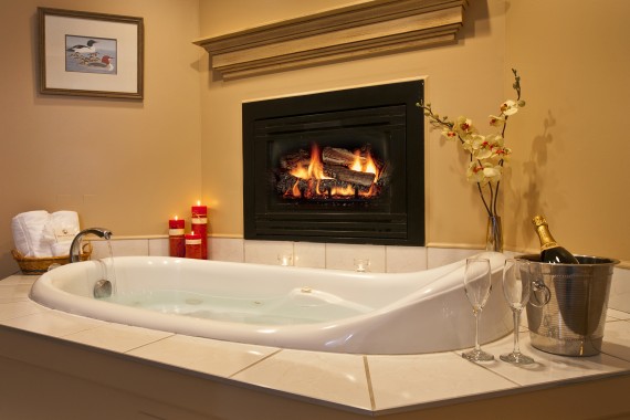 Enjoy the luxury of a Jacuzzi and fireplace in your honeymoon suite.